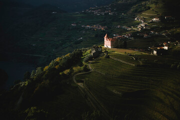 Portuguese village in the rolling hills of the Douro Valley. - obrazy, fototapety, plakaty