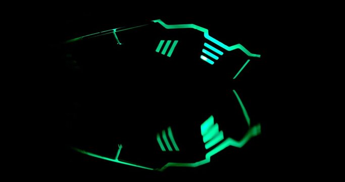 alien starship silhouette shape made by leds light on dark background
