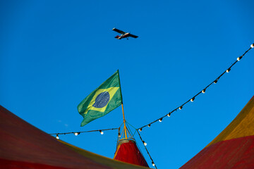 abstract images of a travelling circus tent in red and yellow colors