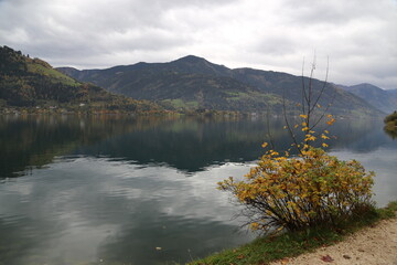 View of lake Zell (Zeller See) in autumn with dramatic clouds