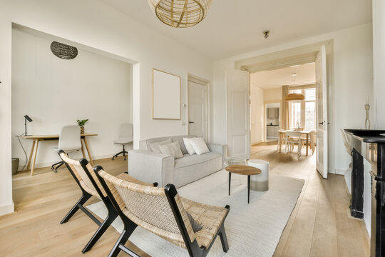Living room with furniture and white walls