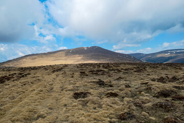 Panoramic view of mountain peak of Amerinkogel on Packalpe, Lavanttal Alps in Styria, Austria. Remote alpine hill landscape in Austrian Alps. Wanderlust. Tranquil serene scene on alpine meadows