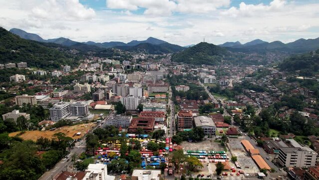Aerial drone view of the city of Teresopolis in the mountainous region of Rio de Janeiro, Brazil with the iconic Alta Market in the foreground