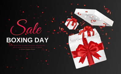 Realistic gift advertising for boxing day with a gift box on black background