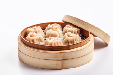 Bamboo steamer filled with Chinese Shumai dumplings on white background.For restaurant menus,culinary blogs and websites. - obrazy, fototapety, plakaty