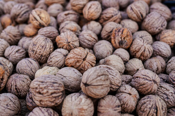 Top down view, whole walnuts displayed on street food market
