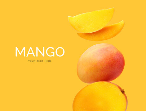 Creative layout made of mango  on the yellow background. Flat lay. Food concept. Macro concept. 