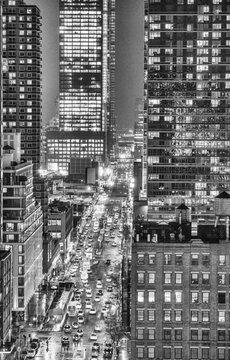 Midtown Manhattan at night. Panoramic aerial view of New York City skyscrapers