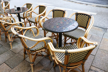 empty tables of summer street cafes on urban streets