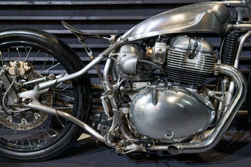 Classic vintage motorcycle with shiny metal body