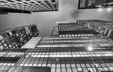 Skyward view of Midtown Manhattan skyscrapers at night