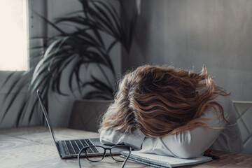 Exhausted young Caucasian female employee sleep desk at office overwork preparing report. Tired woman fall asleep doze off at workplace, work late to meet deadline. Fatigue, exhaustion concept.. - obrazy, fototapety, plakaty