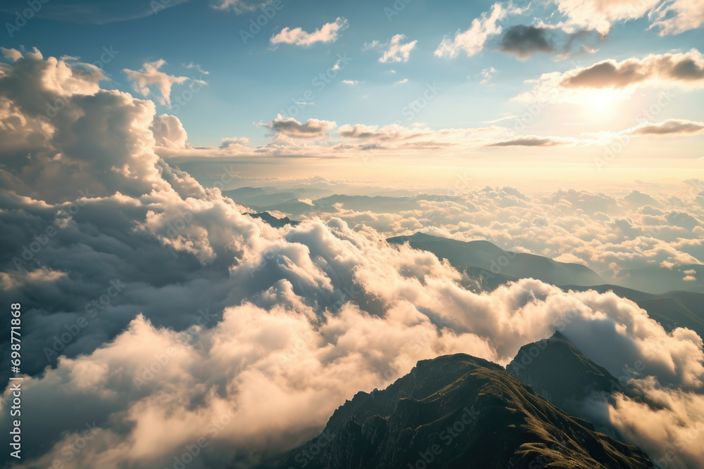 Poster A breathtaking view of a mountain range with clouds in the sky. Perfect for nature and landscape enthusiasts.