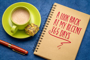 A look back at my recent 365 days - a note in a spiral notebook with coffee, end of year...