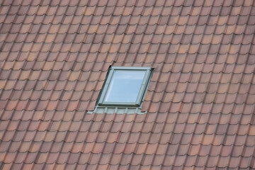 Roof window on metal roof