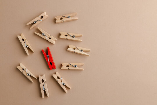 clothes pins on a wooden background