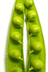 Green peas on white background