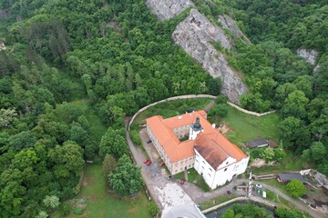 Aerial view of Svaty Jan pod Skalou monastery and village,Bohemia, Czech Republic,Europe