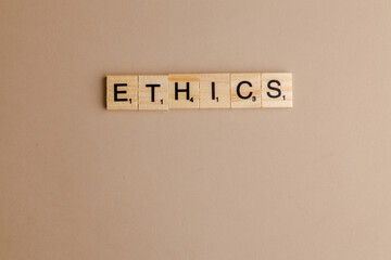ETHICS wood word on compressed board
