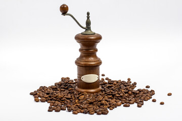 Retro coffee grinder on white background