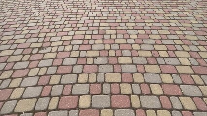 City sidewalk tiles in motion.