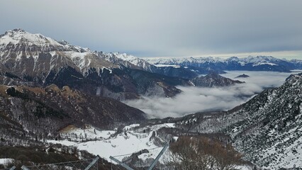 Fototapeta premium Snow capped mountains in the Alps. Piani Di Bobbio, Barzio, Lecco, Italy. Grigna Settentrionale Lake Como