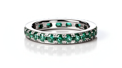 Diamond and emerald ring on a white background