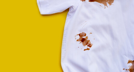 Dirty choclate stain on white shirt