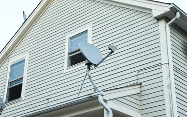 High-tech satellite dish against sky, symbolizing global communication and data transmission