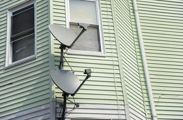High-tech satellite dish against sky, symbolizing global communication and data transmission
