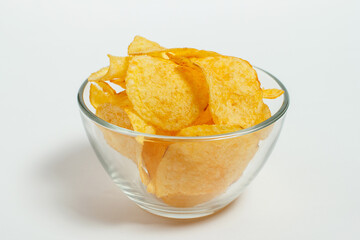 Crispy and salty chips on a white background
