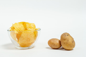 Crispy and salty chips on a white background