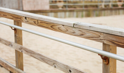 hand railing against bright backdrop, minimalist design, architectural element in urban setting