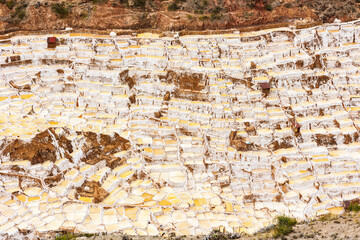 View of the natural salt pools in Las Salineras de Maras in the Sacred Valley of Cusco, Peru, South America. - obrazy, fototapety, plakaty