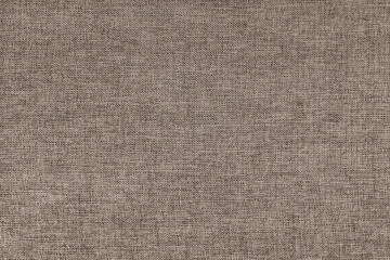 Textile background, brown coarse fabric texture, cloth structure close up, jacquard woven upholstery, furniture textile material, wallpaper, backdrop..