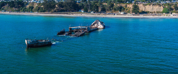 Old tanker ship wreck near the coast of California, USA. Now home to many birds like pelicans and...