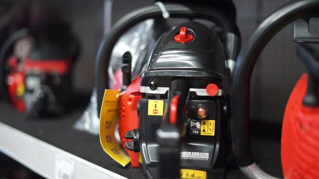 gasoline saw in a store. High quality FullHD footage