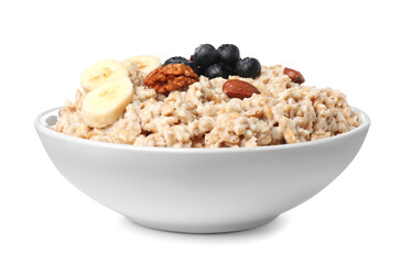 Tasty boiled oatmeal with blueberries, banana and nuts in bowl isolated on white