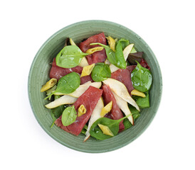 Delicious bresaola salad in bowl isolated on white, top view