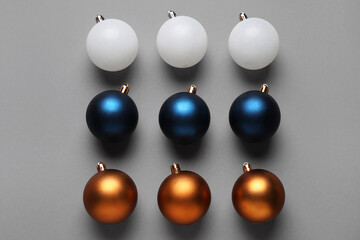 Christmas balls on grey background