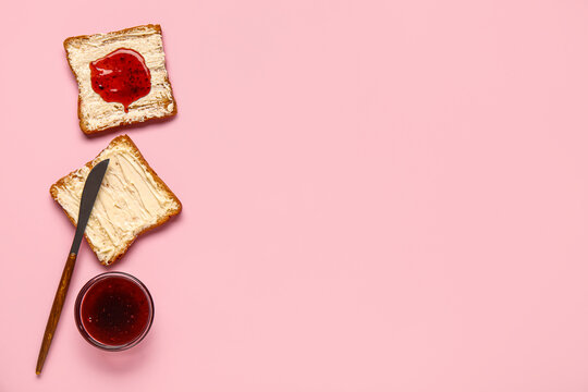 Tasty toasts with butter and jam on pink background