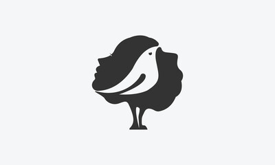 silhouette of bird, face and tree