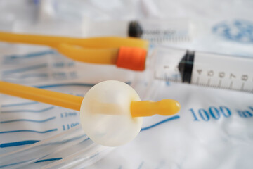 Foley catheter and urine drainage bag collect urine for disability or patient in hospital. - obrazy, fototapety, plakaty