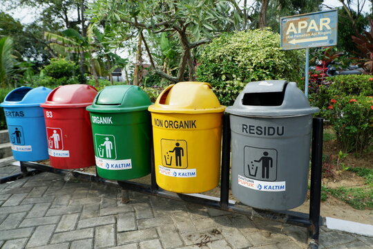PKT or Pupuk Kalimantan Timur Company logo which provides different colored trash bins according to the type of waste. Bontang, East Kalimantan, Indonesia. December 20 2023
