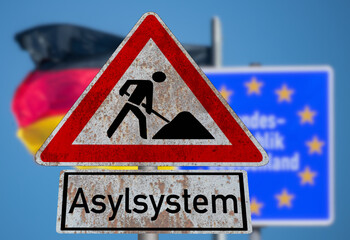 Deutschland und Verkehrszeichen Baustelle Asylsystem