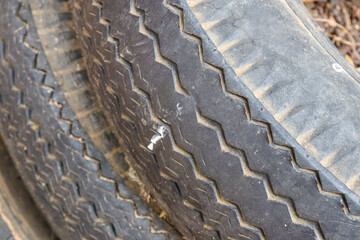 close up of old car tyres
