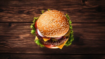 Tasty hamburger on rough old wood background. Space for text.