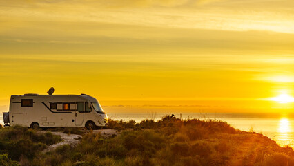 Caravan on nature in the morning at sunrise - obrazy, fototapety, plakaty
