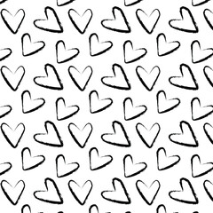 Fototapeta premium Sketch hearts pattern. Hand drawn valentines love heart ornament for wrapping paper, anniversary greeting cards, black ink romance hearts vector seamless background.