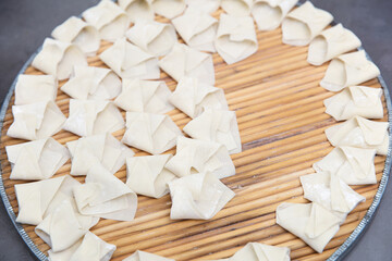 Ravioli arranged neatly on a tray